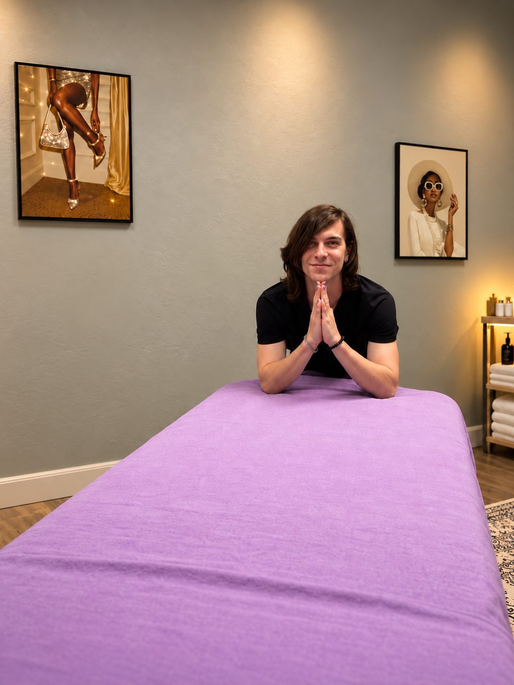 Denis smiling at the massage table